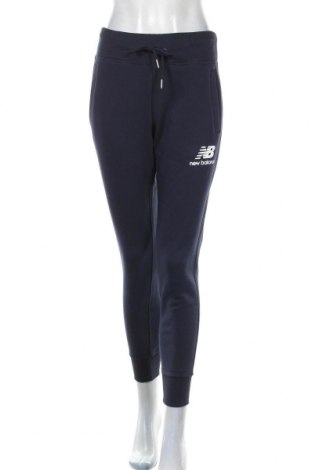 Γυναικείο αθλητικό παντελόνι New Balance, Μέγεθος S, Χρώμα Μπλέ, 65% βαμβάκι, 35% πολυεστέρας, Τιμή 42,14 €