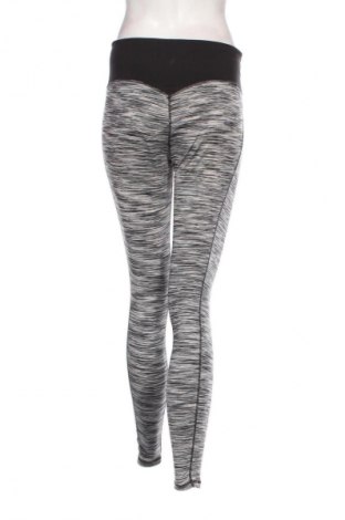 Dámské legíny  H&M Sport, Velikost M, Barva Vícebarevné, Cena  329,00 Kč