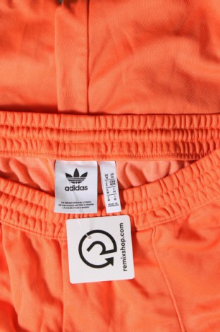 Damskie spodnie sportowe Adidas, Rozmiar M, Kolor Pomarańczowy, Cena 97,99 zł