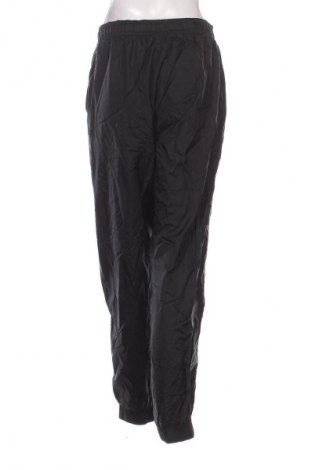 Pantaloni trening de femei Nike, Mărime M, Culoare Negru, Preț 134,99 Lei