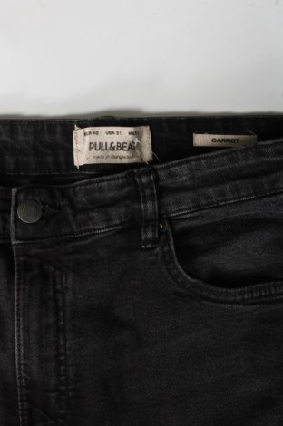 Męskie jeansy Pull&Bear, Rozmiar M, Kolor Czarny, Cena 67,41 zł