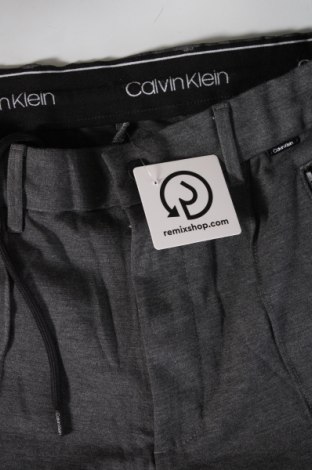 Pánske nohavice  Calvin Klein, Veľkosť S, Farba Sivá, Cena  50,95 €