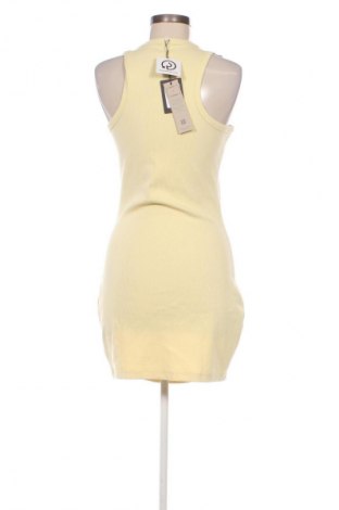 Ruha Tommy Jeans, Méret L, Szín Sárga, Ár 41 959 Ft