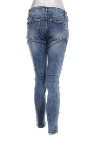 Dámske džínsy  Cartoon, Veľkosť L, Farba Viacfarebná, Cena  7,95 €