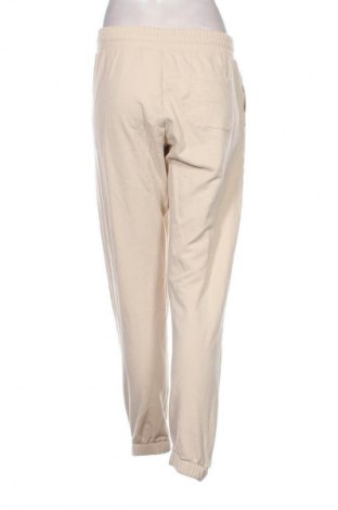 Дамско спортно долнище Champion, Размер M, Цвят Екрю, Цена 17,00 €