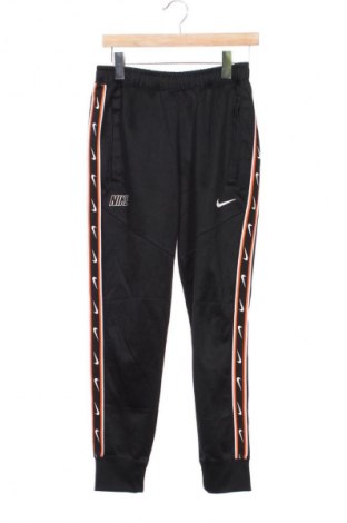 Γυναικείο αθλητικό παντελόνι Nike, Μέγεθος XS, Χρώμα Πολύχρωμο, Τιμή 26,99 €