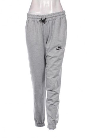 Dámske tepláky Nike, Veľkosť L, Farba Sivá, Cena  34,80 €