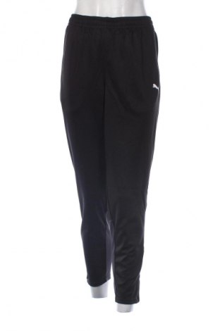 Γυναικείο αθλητικό παντελόνι PUMA, Μέγεθος L, Χρώμα Μαύρο, Τιμή 56,99 €