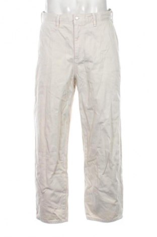 Męskie jeansy Uniqlo, Rozmiar M, Kolor Beżowy, Cena 129,99 zł