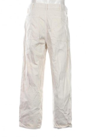 Męskie jeansy Uniqlo, Rozmiar M, Kolor Beżowy, Cena 129,99 zł