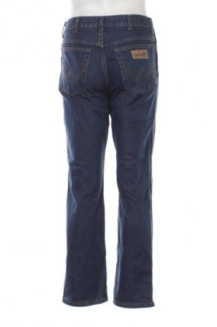 Męskie jeansy Wrangler, Rozmiar M, Kolor Niebieski, Cena 128,99 zł