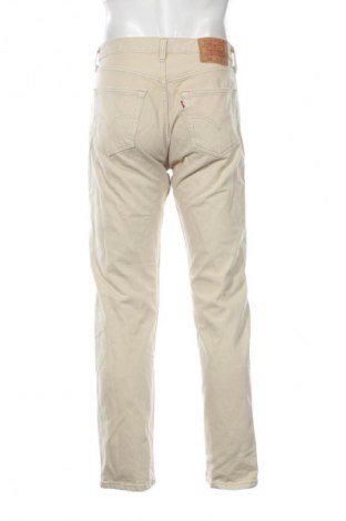 Męskie spodnie Levi's, Rozmiar M, Kolor Beżowy, Cena 504,68 zł