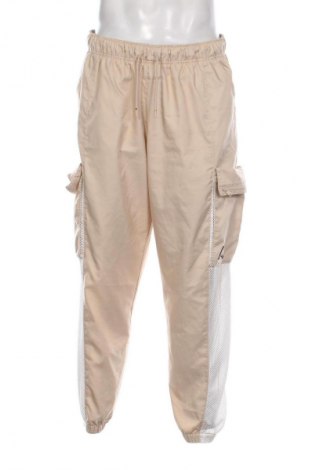 Męskie spodnie sportowe Air Jordan Nike, Rozmiar XL, Kolor Beżowy, Cena 187,55 zł