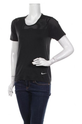 Damen T-Shirt Nike, Größe L, Farbe Schwarz, Preis 26,44 €