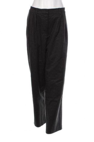 Дамски панталон Guido Maria Kretschmer for About You, Размер XL, Цвят Черен, 52% лиосел, 44% памук, 4% еластан, Цена 116,00 лв.