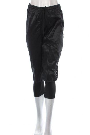 Γυναικείο αθλητικό παντελόνι Hummel, Μέγεθος S, Χρώμα Μαύρο, Τιμή 9,40 €