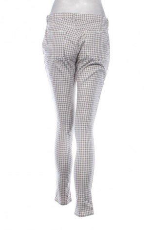 Damskie legginsy Uniqlo, Rozmiar XL, Kolor Kolorowy, Cena 34,99 zł