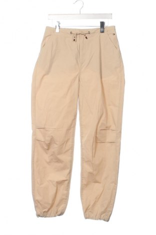 Gyerek nadrág Tommy Hilfiger, Méret 15-18y / 170-176 cm, Szín Bézs, Ár 25 209 Ft