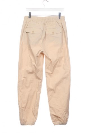 Detské nohavice  Tommy Hilfiger, Veľkosť 15-18y/ 170-176 cm, Farba Béžová, Cena  56,95 €