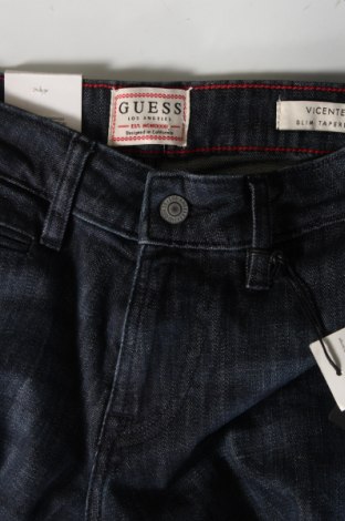 Męskie jeansy Guess, Rozmiar M, Kolor Niebieski, Cena 331,99 zł