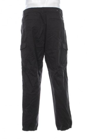 Herrenhose Uniqlo, Größe L, Farbe Schwarz, Preis € 14,99