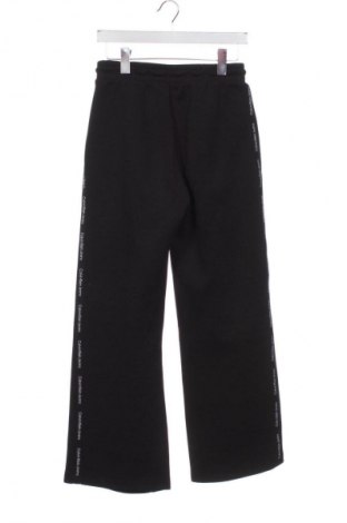 Dámske tepláky Calvin Klein Jeans, Veľkosť XS, Farba Čierna, Cena  35,00 €