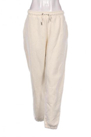Γυναικείο αθλητικό παντελόνι Karl Kani, Μέγεθος M, Χρώμα Εκρού, Τιμή 20,90 €