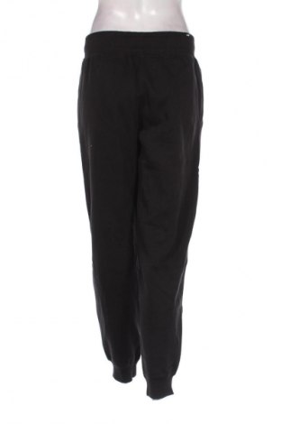 Γυναικείο αθλητικό παντελόνι PUMA, Μέγεθος S, Χρώμα Μαύρο, Τιμή 56,99 €