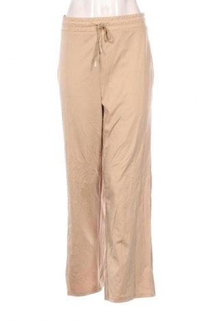 Дамско спортно долнище Unbranded, Размер XL, Цвят Бежов, Цена 8,18 €