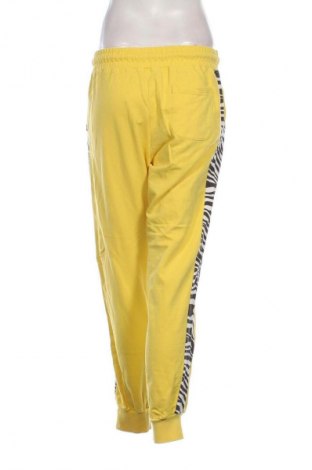 Γυναικείο αθλητικό παντελόνι Wolm, Μέγεθος L, Χρώμα Κίτρινο, Τιμή 17,00 €