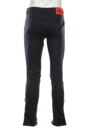 Męskie jeansy Hugo Boss, Rozmiar M, Kolor Niebieski, Cena 282,99 zł
