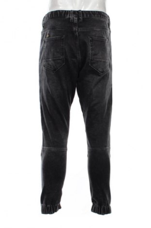 Męskie jeansy Zara, Rozmiar M, Kolor Czarny, Cena 75,01 zł
