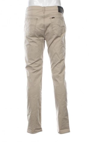 Męskie spodnie Lee, Rozmiar M, Kolor Beżowy, Cena 92,99 zł