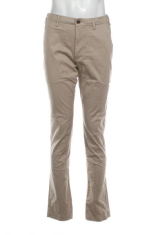 Męskie spodnie Uniqlo, Rozmiar M, Kolor Beżowy, Cena 50,99 zł