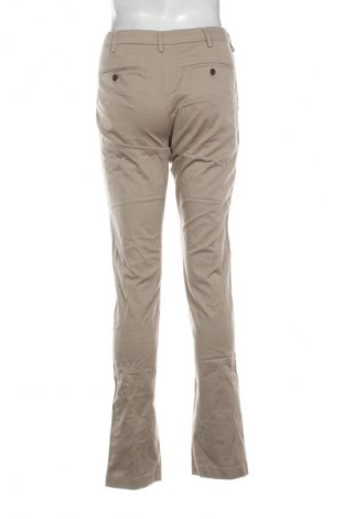 Męskie spodnie Uniqlo, Rozmiar M, Kolor Beżowy, Cena 50,99 zł