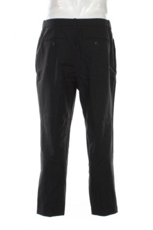 Męskie spodnie Uniqlo, Rozmiar L, Kolor Czarny, Cena 48,99 zł