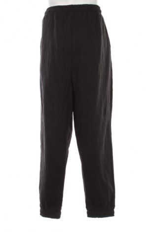 Męskie spodnie sportowe Pretty Little Thing, Rozmiar L, Kolor Czarny, Cena 97,99 zł