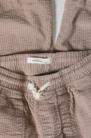 Dziecięce spodnie Reserved, Rozmiar 7-8y/ 128-134 cm, Kolor Beżowy, Cena 40,23 zł