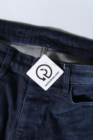 Pánske džínsy  Calvin Klein Jeans, Veľkosť L, Farba Modrá, Cena  45,95 €