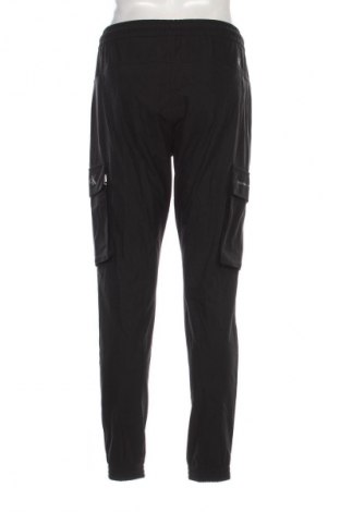 Pánské kalhoty  Calvin Klein Jeans, Velikost S, Barva Černá, Cena  1 089,00 Kč