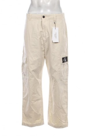 Męskie spodnie Calvin Klein Jeans, Rozmiar M, Kolor ecru, Cena 544,99 zł