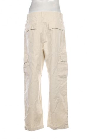 Męskie spodnie Calvin Klein Jeans, Rozmiar M, Kolor ecru, Cena 544,99 zł