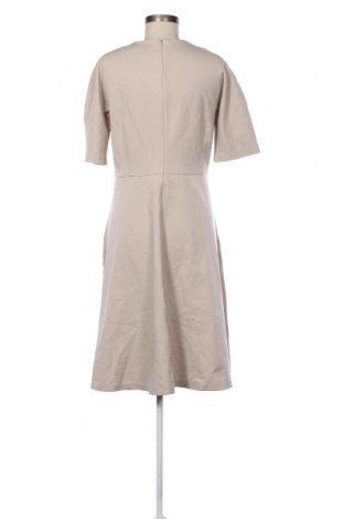 Sukienka Uniqlo, Rozmiar L, Kolor Beżowy, Cena 112,36 zł