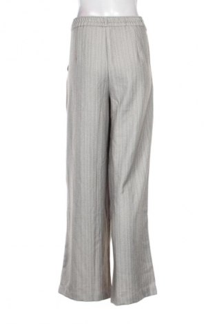 Dámské kalhoty  Sinsay, Velikost L, Barva Vícebarevné, Cena  709,00 Kč