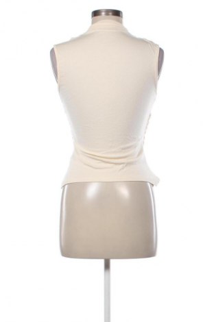 Női top Unbranded, Méret M, Szín Ekrü
, Ár 1 982 Ft