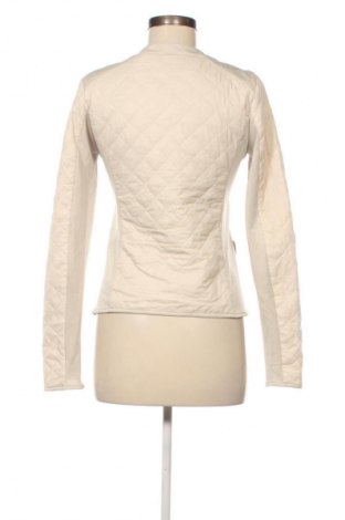 Női dzseki Rinascimento, Méret S, Szín Bézs, Ár 11 169 Ft