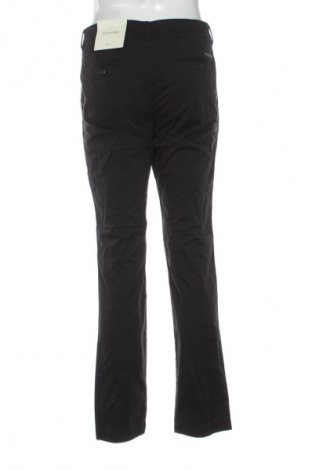 Męskie spodnie Calvin Klein Jeans, Rozmiar M, Kolor Czarny, Cena 404,99 zł