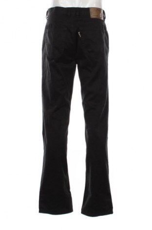 Męskie spodnie Joker, Rozmiar M, Kolor Czarny, Cena 97,99 zł