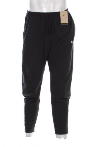 Pantaloni de bărbați Nike, Mărime M, Culoare Negru, Preț 393,99 Lei