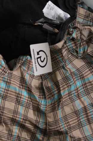 Dětské kalhoty pro zimní sporty  H&M, Velikost 15-18y/ 170-176 cm, Barva Vícebarevné, Cena  302,00 Kč